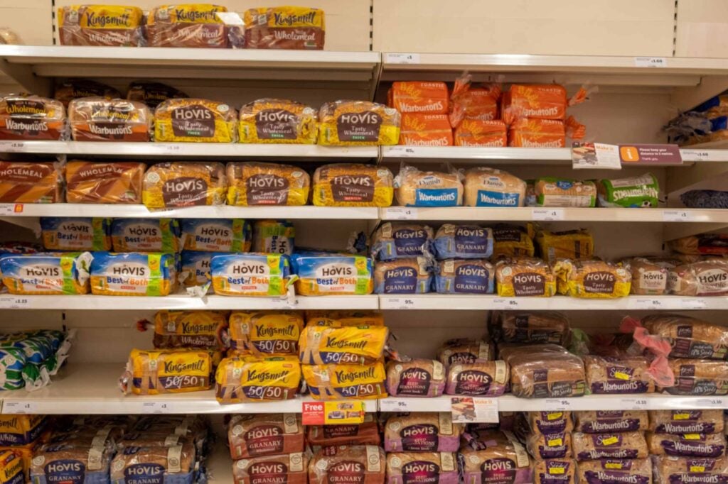 Shelves of supermarket bread.