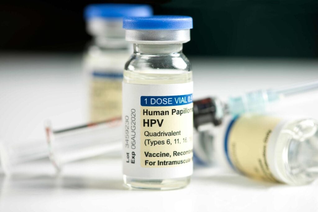 Vials of vaccine for Human Papilloma Virus with a syringe