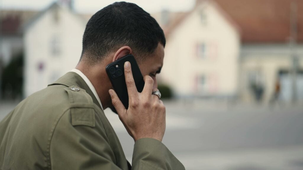Man holding a cell phone to his ear